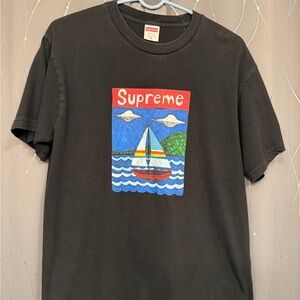 Supreme Black Tee with Vibrant Sailboat Graphic
